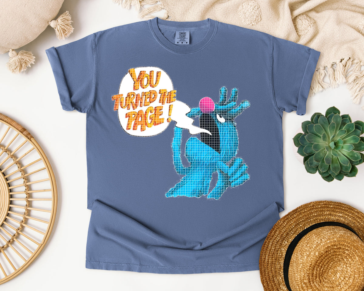 You Turned the Page Graphic Tee product image 1
