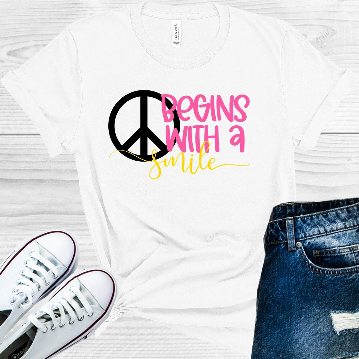 Peace Begins with a Smile Graphic Tee product image 1